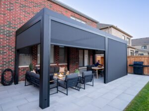 Motorized aluminum pergola in Langley with adjustable louvered roof and integrated LED lighting — BYTS Outdoor Solutions project